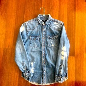 Distressed denim button down shirt from Zara. In perfect condition.